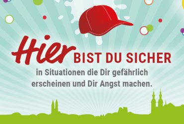 Schriftzug "Hier bist du Sicher in Situationen die dir gefährlich erscheinen und dir Angst machen." auf türkisem/grünem Hintergrund.